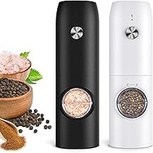 three different types of pepper grinders and spices