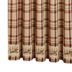 a window curtain with a plaid pattern and trees on the bottom, in front of a white background