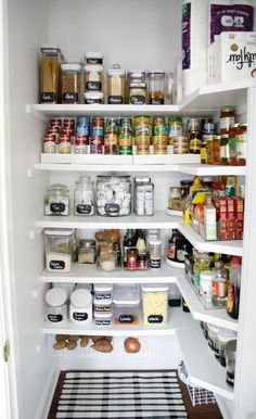 an organized pantry with lots of food in it