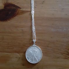 One Ounce Charm On 20in Silver Chain Classic Round Chain Necklace With Coin Pendant, Classic Coin Pendant Chain Necklace, Classic Sterling Silver Coin Necklace, Layered Cross Necklace, Elephant Pendant Necklace, Silver Eagle, Mens Silver Necklace, Star Pendant Necklace, Silver Eagles