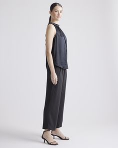 Elevate the classic tank with this high-neck cut in an ultra-flattering, drapey fit. Our 100% mulberry silk satin feels sumptuous to the touch, yet is durable enough to be machine washed for a piece that’s equal parts low-maintenance and luxe.  | Quince | Women's Halter Top in Black, Size XS, Silk Sleek Satin Sleeveless Tank Top, Sleek Sleeveless Satin Tank Top, Chic Silk Tank Top For Work, Silk Halter Top, Womens Halter Tops, Natural Textiles, Alice And Olivia, Fabric Structure, Blazer With Jeans