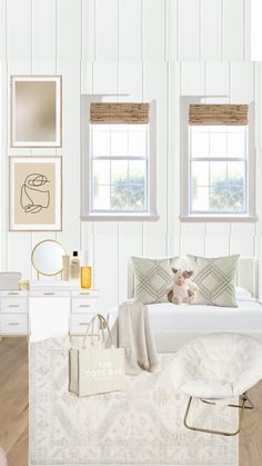 a bedroom with white walls and wooden floors