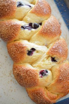 blueberry bread is sitting on a baking sheet