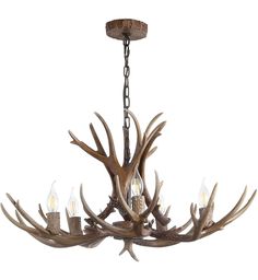 the antler chandelier is made from wood and has five lights on it