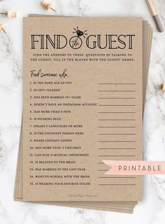 the printable find and guest game is laid out on top of a marble table