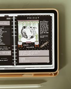 a tablet with an image of a pig on it's screen and some writing