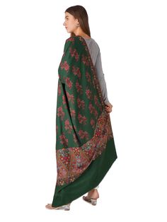 Discover timeless elegance with our Classic Green Pashmina Shawl, adorned with exquisite embroidery. Crafted from luxurious pashmina, this shawl combines traditional craftsmanship with contemporary style, perfect for enhancing your wardrobe with sophistication. Product Details: Hand Embroidered Kashmiri Pashmina Shawl Material: Pure Pashmina (100% Cashmere) Size: 100 cm X 203 cm / 40 Inch X 80 Inch / 1.1 x 2.2 Yards (Approx) Color: Green Embroidery: Elegant and intricate patterns Origin: Handcra