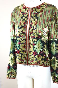 "I love the colors in this jacket....the greens..perfect for you green eyed ladies...and the deep red...oh..so beautiful..would be amazing in the holidays..or in the fall...great jacket for your formal occasions in Excellent condition! Measuring: Length: 18\" Width: 42\" Sleeves: 23\" Pet Free/smoke free Enjoy!" Vintage Festive Party Outerwear, Festive Vintage Party Outerwear, Vintage Embellished Outerwear For Festive Occasions, Festive Beaded Fall Outerwear, Vintage Fitted Outerwear For Festive Occasions, Fall Party Outerwear With Embroidery, Beaded Fall Festive Outerwear, Glamorous Embellished Outerwear For Festive Occasions, Bohemian Party Outerwear With Embroidery