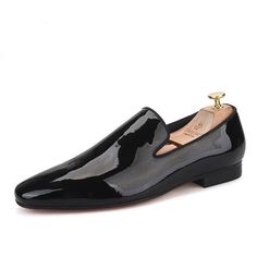 Sleek Black Slip-ons With Rubber Sole, Black Business Loafers With Rubber Sole, Black Plain Toe Slip-on Tassel Loafers, Black Patent Leather Loafers With Rubber Sole, Black Slip-on Tassel Loafers With Plain Toe, Black Plain Toe Tassel Loafers, Sleek Black Loafers With Leather Sole, Modern Black Tassel Loafers For Formal Occasions, Black Slip-on Tassel Loafers For Business Casual