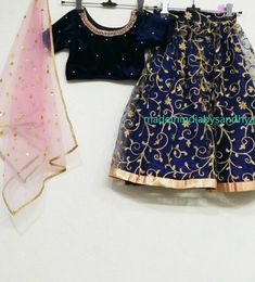 Product: Custom made girls kids dress. Size : All sizes possible. Price listed for dress for kids up to age 1-4 years. Additional $10 for age 4-8 years. Additional $20 for age 8-12 years. Fabric: Lehenga- Soft net Top - velvet Dupatta - embroidered net Delivery Time : Please let me Know if you are ordering for any special dates kindly inform me for any dates or times frame you keeping in mind. Festive Velvet Lehenga For Diwali, Velvet Lehenga For Diwali Festive Occasion, Velvet Sharara For Party And Festivals, Diwali Velvet Anarkali Choli, Velvet Lehenga With Zari Work For Navratri, Fitted Velvet Dress For Diwali, Navratri Velvet Lehenga With Pallu, Velvet Sets With Dori Work For Diwali, Velvet Sets With Pallu For Diwali