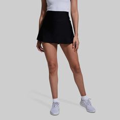 Ladies Tennis Golf Skirt | Born Primitive | Skirt with Built-In-Shorts Sporty Black Skort For Tennis, Black Athleisure Skort For Tennis, Black Athleisure Tennis Skort, Sporty Black Tennis Skort, Fitted Black Tennis Skirt With Pockets, Black Fitted Tennis Skirt With Pockets, Fitted Black Tennis Bottoms, Black Sports Skort With Pockets, Sporty Black Skort With Pockets