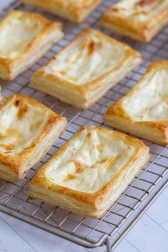 there are many small square pieces of food on the cooling rack and it is ready to be eaten