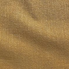 a gold cloth textured with metallic foil