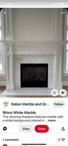 an image of a fireplace in the middle of a room with white walls and trim