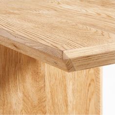 a close up view of the top of a wooden table