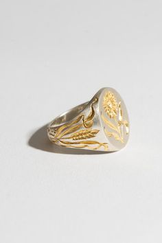 Castro Smith | SUNFLOWER RING – RELIQUARY Signet Ring Wedding Band, Signet Ring Engraving Ideas, Unique Signet Ring, Engraved Gold Ring, Engraved Jewelry Ideas, Silver Clay Rings, Signet Ring Engraving, Stamp Rings, Signet Engagement Rings