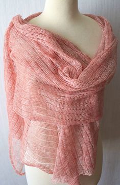 This salmon linen shawl / scarf is a great accessory, wearable every day, on special events or even on the beach. It is made of 100% natural linen in salmon/ pink melange, - comfortable, breathing and pleasant to skin. The approximate measurements - 225*50 cm or 89*20 inches Please, hand wash it separately in a lukewarm water, lay flat to dry and iron with steam if necessary. I ship internationally. These shawls are available also in many different other colours, please, check my linen shawl sec Bohemian Pink Shawl For The Beach, Pink Shawl Scarves For Spring, Handmade Pink Shawl For Spring, Pink Shawl Scarf For Beach, Coral Scarf, Linen Shawl, Wrapped Lights, Bohemian Hand-knitted Shawl Wrap, Rosé Brown