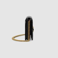 Description The chain wallet in black leather is introduced as part of the Gucci 1955 Horsebit accessories collection, defined by the double ring and bar design also found in Handbags. The folded snap-closure shape features several card slots and pockets, completed with a detachable chain strap. Size: 7.5″W x 3.9″H x 1.6″D / 19 x 9.9 x 4 cm 100% genuine materials, matching the quality of the Gucci product (imported from Europe); Black leather Gold-toned hardware Moiré and suede lining Horsebit detail 6 credit card slots 1 zipper pocket 1 open pocket Detachable chain with 22.8″ drop Snap button closure Open: 7.5″W x 8.3″H x 1″D Comes with dust bag, ation cards, and pamphlets 1:1 mirror image qualityDelivery 5-8 or 10-15 working days Please note that during high season and Sale period, deliv Gucci Chain Wallet, Wallet With Chain, Gucci Crossbody, Gucci Horsebit, Chain Wallet, Double Ring, Accessories Collection, Wallet Chain, 6 D