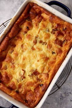 a casserole dish with meat and cheese in it