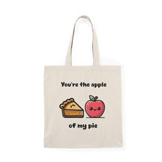 Sweeten your day with our "You're the Apple of My Pie" tote bag, a charming design that blends culinary cuteness with a dash of affection. This tote features a playful cartoon apple and a delightful pie, perfectly pairing to create a heartwarming pun that celebrates a classic dessert and a special someone. Product Features: Size and Material: Measuring 40 x 38 cm (15.7 x 15 inches), this tote is crafted from 100% recycled cotton, promoting sustainability without sacrificing style or durability. Cute Canvas Bag For Gifts, Cute Cotton Canvas Bag For Gift, Cartoon Apple, Show Appreciation, Classic Desserts, Baby Bag, Cotton Bag, Recycled Cotton, Statement Pieces