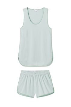 The Pima Tank-Short Set in Parisian Green, a soft stripe inspired by sidewalk cafés and the Luxembourg Gardens, features a sleeveless scoop neck top and shorts with an elastic waistband. Made from 100% Pima cotton. Sporty Pajama Shorts For Summer Relaxation, Athleisure Pajama Shorts For Summer Relaxation, Summer Athleisure Pajama Shorts For Relaxation, Short Length Summer Tops For Relaxation, Short Summer Tops For Relaxation, Summer Tops For Relaxation, Short Length, Sleeveless Athleisure Loungewear Sets, Sleeveless Athleisure Sets For Loungewear, Summer Loungewear Tank Top Short Length