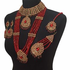 bridal jewellery set. Set includes- Necklace  Mala  Earrings  Jhumar  Tikka  1 Panjagla  Nose ring Festive Kundan Jewelry For Marriage, Bollywood Bridal Sets With Stone Work For Gifts, Bollywood Meenakari Jewelry For Marriage, Red Tilla Bridal Sets For Marriage, Red Bridal Sets With Tilla For Marriage, Bollywood Jewelry Sets For Marriage On Diwali, Bollywood Style Kundan Jewelry For Marriage, Bollywood Chandbali Jewelry For Marriage, Bollywood Jewelry Sets For Marriage And Diwali