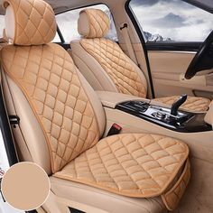 the interior of a car with beige leather seats