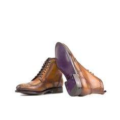 With its beautiful brogue pattern and classic silhouette, the Military Brogue boot is an essential in every man's closet. Reminiscent of a soldier's boots, the Military Brogue boot is equal parts rugged and refined. The Details: *Burnished Materials: cognac box calf Sole: lilac Goodyear welt leather rubber sole Last: Zurigo - Rounded toe for fraditional English Look What is Fast Lane? Fast lane is our new experimental 7 day made to order collection, an ambitious never been heard of before collec Classic Chelsea Boots With Brogue Detailing And Cap Toe, Brown Goodyear Welted Wingtip Lace-up Boots, Brown Cap Toe Lace-up Boots With Brogue Detailing, Brown Cap Toe Chukka Boots For Business, Elegant Brown Chelsea Boots With Brogue Detailing, Brown Cap Toe Chelsea Boots For Formal Occasions, Formal Brown Cap Toe Chelsea Boots, Brown Wingtip Lace-up Boots Goodyear Welted, Brown Wingtip Lace-up Boots With Goodyear Welt