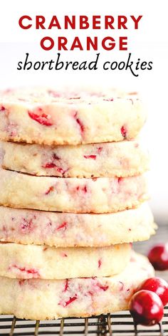 cranberry orange shortbread cookies stacked on top of each other