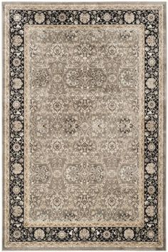 an area rug with black and white accents on the border, in front of a white background