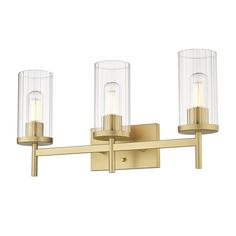 three light brass bathroom fixture with clear glass shades and gold metal frame, on an isolated white background