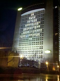 a very tall building lit up at night