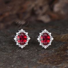 Product Detail Material: 925 Sterling Silver, 10k/14k/18k Solid Rose/White/Yellow Gold, Platinum Quantity: 2pcs (a pair) earrings Center Stone: 6x8mm Oval Cut Lab Ruby Side Stones: Round Cut Moissanites Custom Service 1, Gemstones can be replaced with others. 2, All metal can be customized. 3, The earrings can be customized according to the design you want. Please contact us if you need any personalized custom earrings. We will try our best to meet your needs. Only you can't think of it, we can' Red Oval Diamond Earrings For Anniversary, Oval Red Diamond Earrings For Anniversary, Oval Halo Setting Earrings For Anniversary, Oval Halo Sterling Silver Earrings, Oval Gemstone Earrings For Anniversary, Ruby Stud Earrings, Ruby Earrings Studs, Earrings Art Deco, Handmade Pendant Necklace