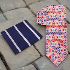 Introducing our vibrant Red, Navy Blue, and Yellow Gold Mosaic Geometric Silk Necktie—a statement piece that effortlessly blends bold colors with a sophisticated pattern. Crafted from luxurious silk, this necktie is available in two widths: a traditional 3.25 inches or a sleek thin tie at 2.5 inches. Choose from regular (60 inches) or extra-long (63 inches) lengths to suit your style and fit preferences. For a coordinated look, pair this striking necktie with our matching pocket square, which co Brown Bow Tie, Grey Bow Tie, Navy Blue And Yellow, Yellow Bow Tie, Purple Bow Tie, Polka Dot Bow Tie, Gold Mosaic, Green Bow Tie, White Bow Tie