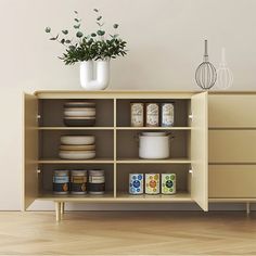 an empty shelf with some jars and containers on it