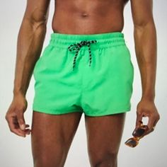 Speedo Men's Surf Runner Shorts Move Seamlessly From The Gym To The Pool In This Versatile Boardshort. Inner Briefs Elastic Waist Size - S/P Color - Lime Green Condition - Brand New With Tag Nwt Style - Sporty Green Athletic Shorts For Beach Season, Stretch Green Swim Trunks With Pockets, Green Athletic Shorts For Beach Season Vacation, Stretch Green Swim Trunks For Vacation, Green Stretch Swim Trunks For Vacation, Green Stretch Swim Trunks With Pockets, Green Sports Bottoms For Beach Season, Green Relaxed Fit Swimwear For Sports, Casual Solid Swim Shorts