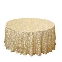 a round tablecloth with an intricate design on the top and bottom, in gold