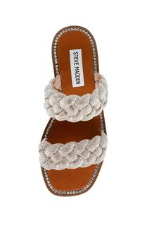 The Newbie slide sandal from Steve Madden infuses a touch of glamor to your casual, warm weather style. The tightly braided straps and footbed are decorated with stones to exude a sparkly vibe with every step. Synthetic upper Slip-on Square open toe Synthetic lining If you would like to see more photos or speak with one of our stylists with any further questions regarding this specific product, please call us at 678-309-9550 anytime during business hours! Flower Boutique, Rhinestone Material, Braided Sandals, Rhinestone Sandals, Studded Sandals, Rhinestone Studs, Silver Rhinestone, Handbag Accessories, Maxi Dresses