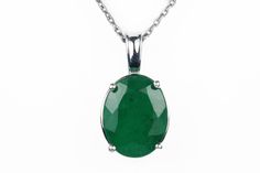 Featured here is a stunning oval emerald necklace in fine .925 sterling silver. Displayed in the center is a rich-green emerald accented by a floral four-prong silver mount, allowing for the emerald to be shown in full view. Minor flaws are normal and add to the beauty of this earthy piece. The earth mined, green Colombian emerald has a desirable lush green color with excellent qualities. An 18-inch sterling silver chain will be provided with this beautiful pendant! This necklace is ideal for ev Fine Jewelry Emerald Necklace In Sterling Silver, Oval Silver Emerald Necklace For Anniversary, Silver Oval Emerald Necklace For Anniversary, Classic Oval Emerald Necklace For Gift, Luxury Oval Emerald Necklace For May Birthstone, Oval Hallmarked Emerald Necklace For Formal Occasions, Oval Emerald Necklace In Silver For Anniversary, Formal Oval Pendant Emerald Necklace As Birthstone, Oval Emerald Birthstone Necklace