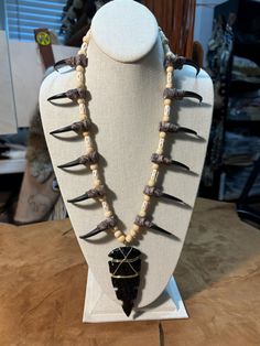 Replica eagle claw necklace with hand knapped obsidian heavy serrated point, resin claws, bone beads Handmade Black Claw Jewelry, Unique Hand Tooled Black Jewelry, Powwow Regalia, Wasteland Weekend, Claw Necklace, Eagle Claw, Arrow Head, Bone Necklace, Bear Necklace