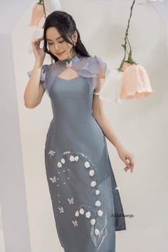 These are various beautiful styles of modern Ao Dai. These are competitively priced because while they are beautiful ao dai, but there are some subtle flaws not to my shop's standard. No issue to the ao dai itself, just the embellishment are not as quality as I would like. So these ao dai sets are priced much lower than retail. Each set comes with the Ao Dai and matching pants. The form also is a little smaller, so expect about half and inch smaller for the measurements. Please note: These are b So Dai, Lace Ao Dai, Traditional Vietnamese Clothing, Modern Ao Dai, Party Wear For Women, Vietnamese Clothing, Grad Outfits, Modern Qipao, Clothing Reference