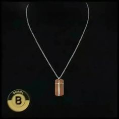 En el momento en que te pones este collar especial, se apodera de ti una energía sutil pero distintiva. El crucifijo de palisandro liso tiene un aura casi mística que te hace sentir conectado y conectado. Mientras los duraderos eslabones de acero descansan contra tu pecho, estarás un poco más alto. Hay algo silenciosamente poderoso en un estilo que combina lo moderno y lo orgánico.

 Especificaciones:
 Materiales : Acero inoxidable con colgante de palisandro.
 Acabado : Pulido
 Longitud : 22" | 56cm
 Tamaño del colgante : 1,496" | 3,8 cm x 0,709" | 1,8 cm
 Peso : 24 g

 Cuando se trata de collares para hombres, el acero inoxidable aporta fuerza, brillo y credibilidad callejera. Los collares de acero inoxidable entrelazan anillos, discos o cuentas de metal en texturas increíbles, perfectas Gothic Stainless Steel Necklace With Oxidized Finish, Black Stainless Steel Chain Necklace With Lobster Clasp, Gunmetal Oxidized Stainless Steel Necklace, Punk Stainless Steel Nickel-free Necklace, Diamante Bracelet, Men’s Crucifix Necklace, Leather Choker Necklace, Special Necklace, Pearl Choker Necklace