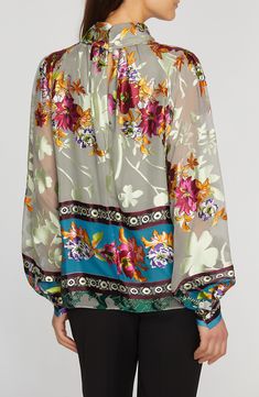 A vivid print enlivens this blousy silk-enriched top designed with a high neckline and billowed sleeves. 26 1/2" length Back keyhole with button-and-loop closure Mock neck Long sleeves with button cuffs 54% viscose, 34% nylon, 12% silk Dry clean Imported Floral Shoes, Fringe Skirt, Elie Tahari, Satin Blouse, Satin Top, Mens Scarves, Blue Blouse, Geneva, High Neckline