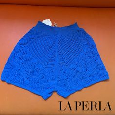 A Stylish Pair Of La Perla Beyond The Beach Knitwear Shorts Authentic Rare, Limited Edition New, With Tags Size: M The Beyond The Beach Shorts Are Crafted In An Openwork Knit For Subtle Mosaic Patterning That Translates A Mid-Rise Silhouette Into Something Brimming With Wanderlust. Beautiful Royal Blue Color 96% Viscose 4% Polyester Chic And Versatile! 12” Rise, 2” Inseam Summer Pointelle Knit Bottoms, Summer Stretch Pointelle Knit Bottoms, Knit Bottoms For Summer Vacation, Summer Vacation Knit Bottoms, Summer Knit Beach Bottoms, Blue Knit Bottoms For Spring, Spring Blue Knit Bottoms, Summer Knit Short Bottoms, Summer Knit Bottoms Short Length