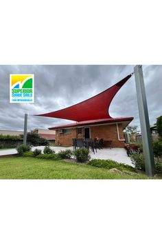 a large red shade covering the outside of a house