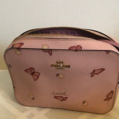 This Bag Is Small, But Cute! This Is A Mini Camera Bag, Approximate Dimensions Below Approximate Dimensions. 7(L) X 2(W) X 5(H) New With Tags Inside Original Strap Inside Of Bag Smoke Free Home Pet Free Home Listed Price Obo Coach Clutch Bag With Zipper Closure, Pink Coach Bag As Gift, Coach Bags With Removable Pouch As Gift, Coach Leather Bags As A Gift, Coach Crossbody Shoulder Bag Gift, Coach Top Handle Shoulder Bag As Gift, Coach Crossbody Shoulder Bag For Gift, Pink Coach Clutch Bag, Chic Coach Shoulder Bag Gift