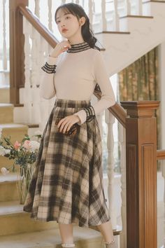 The vintage plaid circle skirt you've been looking for. Features a rustic plaid pattern in a thick tweed fabric, elastic waistband and modest midi length. Lined. S: 25"-35" waist, 27" lengthM: 26"-36" waist, 27" lengthL: 27"-37" waist, 27.5" lengthXL: 28"-38" waist, 27.5" length Cottage Skirt, Tweed Fabric, Vintage Plaid, Overall Dress, Circle Skirt, Tartan Plaid, Sweater Blouse, Cardigan Jacket, Plaid Pattern