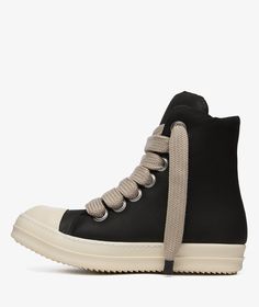 Rick Owens, a brand known for its avant-garde designs and dark aesthetic, continues to push the boundaries of luxury and design in the fashion industry.Introducing the Jumbo Lace Padded Sneakers from Fall/Winter 2024 collection. These luxurious and stylish black sneakers are a must-have for those who appreciate high-end footwear.Step up your sneaker game with Rick Owens' iconic style! Get your pair now at SVD. Rich Owens Shoes, Rick Owens Jumbo Lace, The Rick, Sneakers Noir, Basket Noir, Fall Winter 2024, Sneaker Games, Traditional Fashion, Fall Shoes