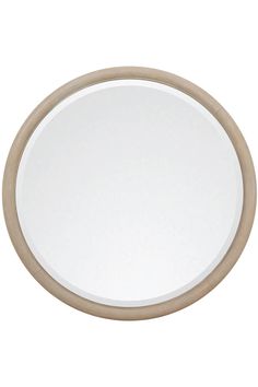 a round mirror with wood trim around it