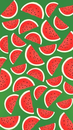 watermelon slices are arranged on a green background